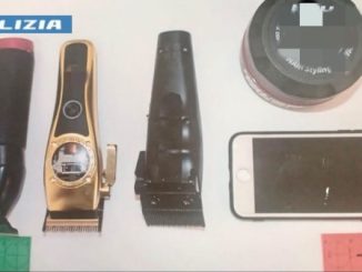Como spaccata negozio polizia