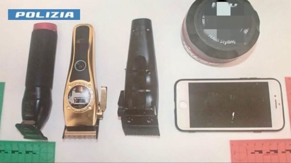 Como spaccata negozio polizia